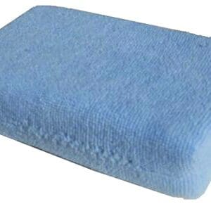 A blue towel is sitting on top of the floor.