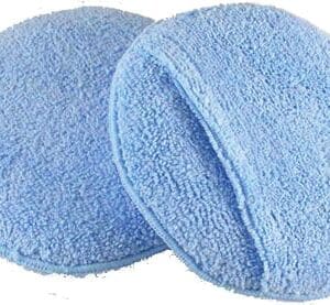 A pair of blue microfiber pads sitting on top of each other.