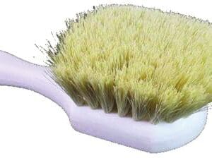 A white brush with yellow bristles on top of it.