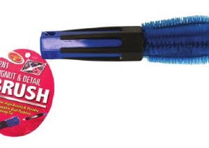 A blue toothbrush with a red sticker on it.