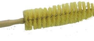 A yellow brush is shown on the white background.