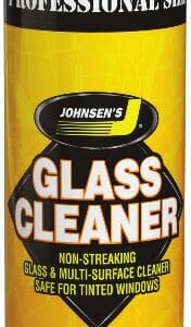 A glass cleaner bottle with yellow label.