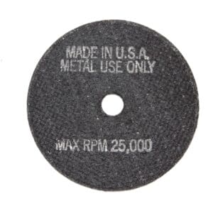A black circular metal cutting wheel with the words " made in usa metal use only ".