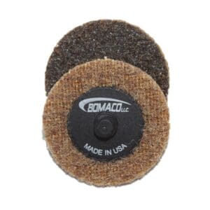 A pair of brown and black discs are next to each other.