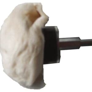 A white cloth is on top of the brush.