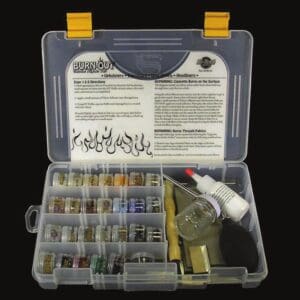 A plastic container with some paint and tools inside