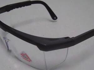 A pair of safety glasses on top of a table.