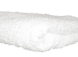 A white towel is laying on the ground.