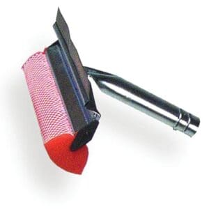 A red and black brush is hanging on the wall